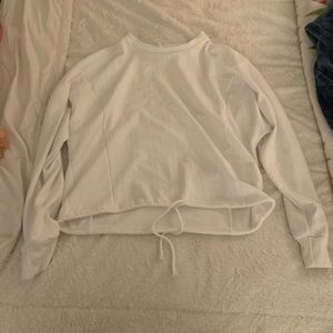 White medium never worn hoodie with cute strings to tie!